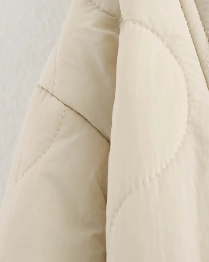 Camille Cannes | Veste matelassée chaude avec détail léopard