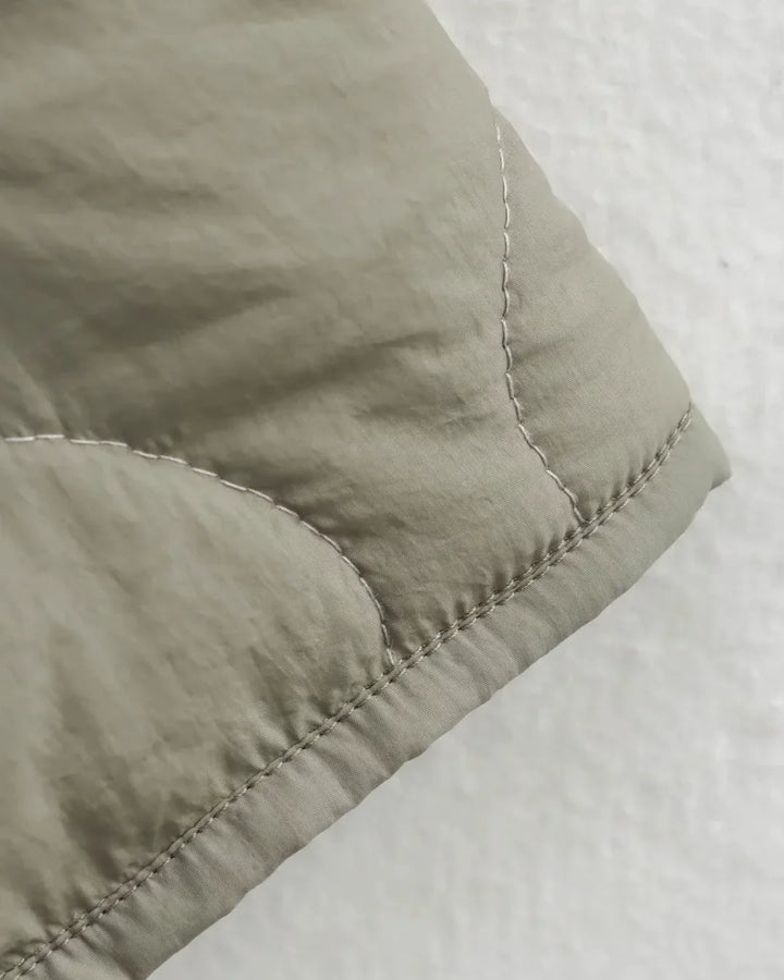 Camille Cannes | Veste matelassée chaude avec détail léopard